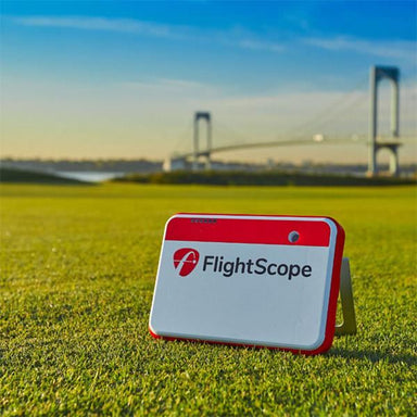 FlightScope Mevo+2023 Edition Launch Monitor and Simulator Front View in Front of Bridge